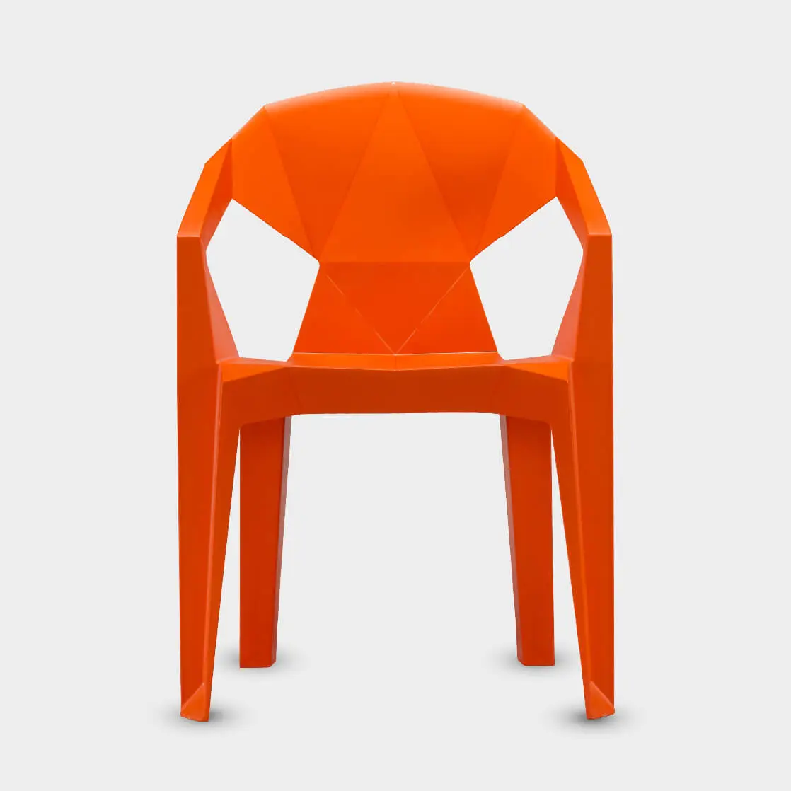 Merryfair Muze stacking chair in orange, faceted one-piece polypropylene