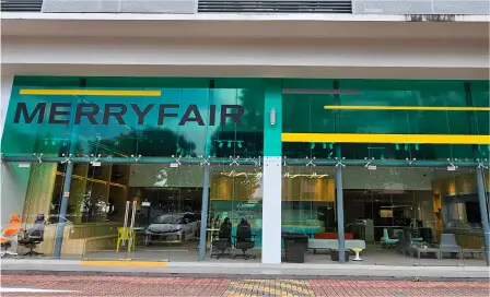 Merryfair's Singapore showroom, a glass shopfront with the Merryfair name